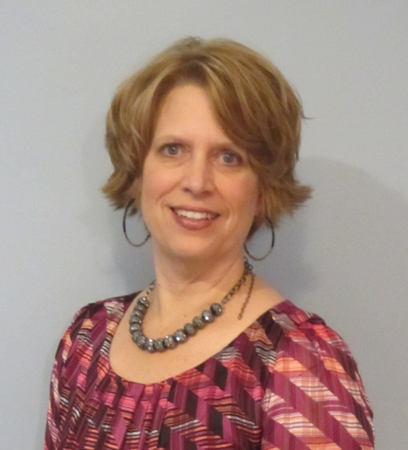 Sue Redepenning, President, LiveLife Therapy Solutions, Inc. portrait of Sue Redepenning, smiling